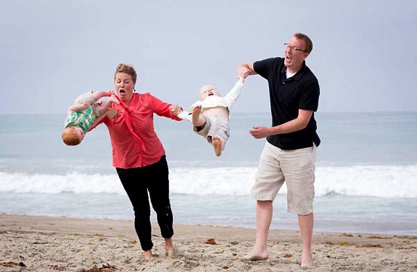 The magical moment Elizabeth tried to swing 6 month-old Edison around for a family photo.